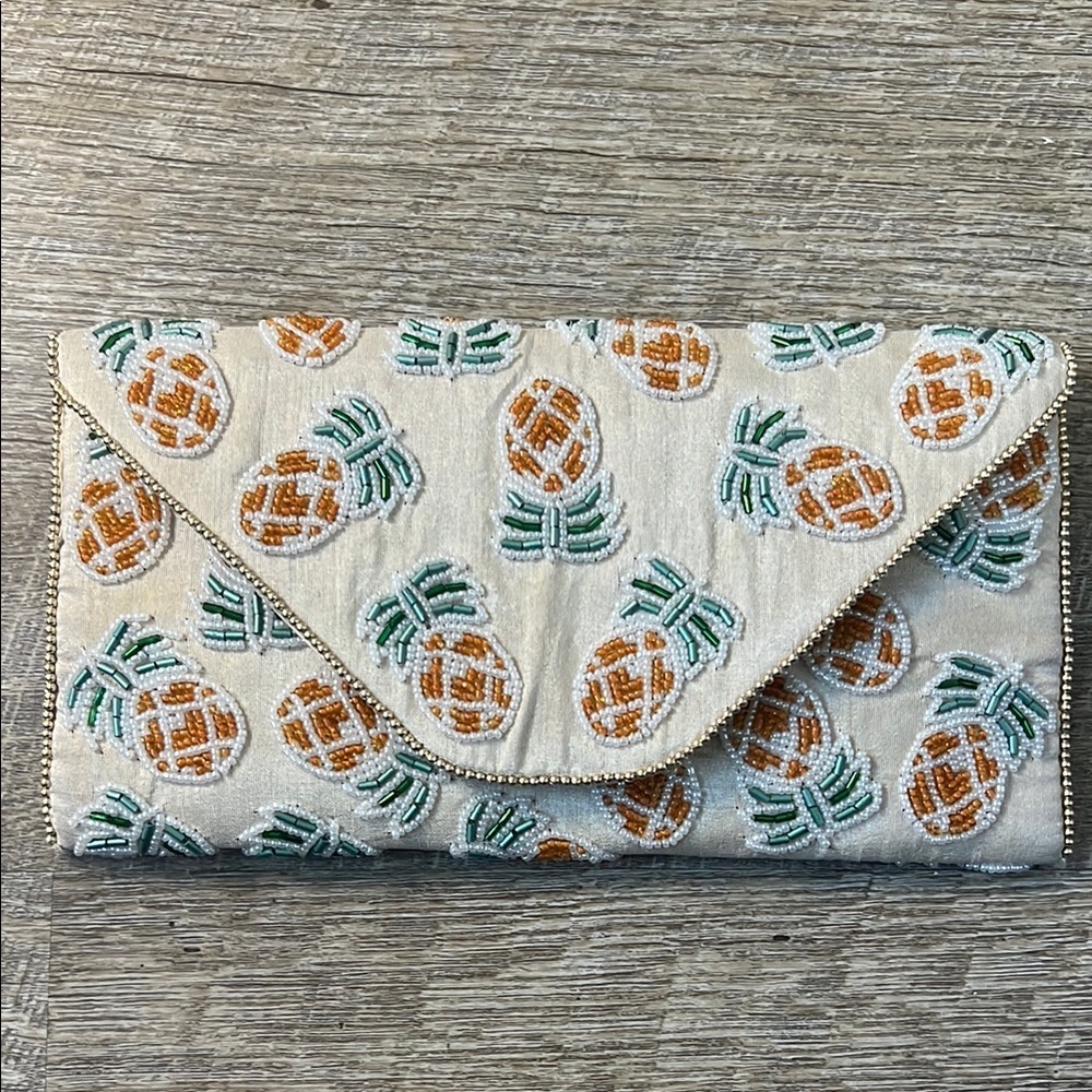From St. Xavier Beaded Pineapple Clutch